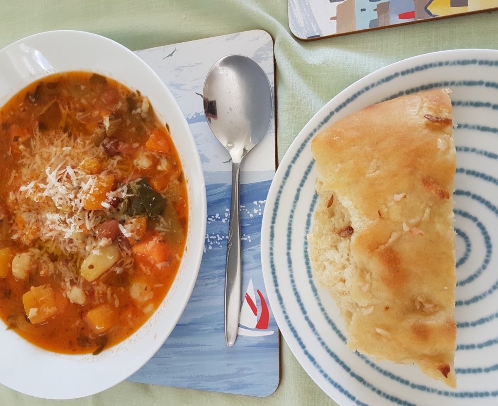 Ligurian Ministrone and a slice of focaccia bread.